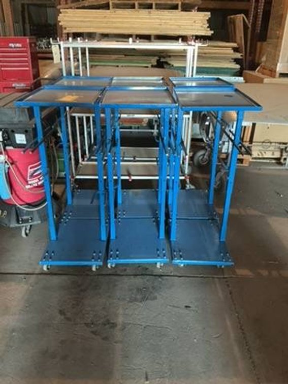 6 Blue Specialty Carts Built for Automotive Program