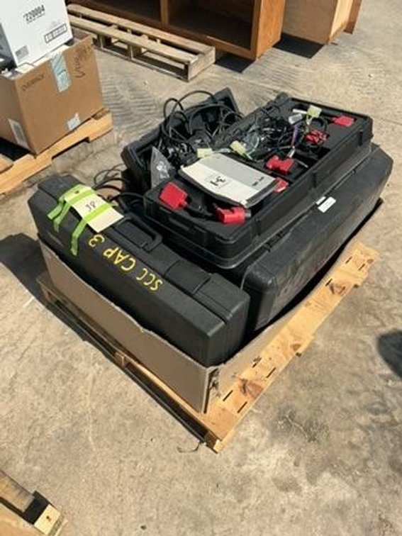 Various Handheld Scan Tools and Leads in Carrying Cases