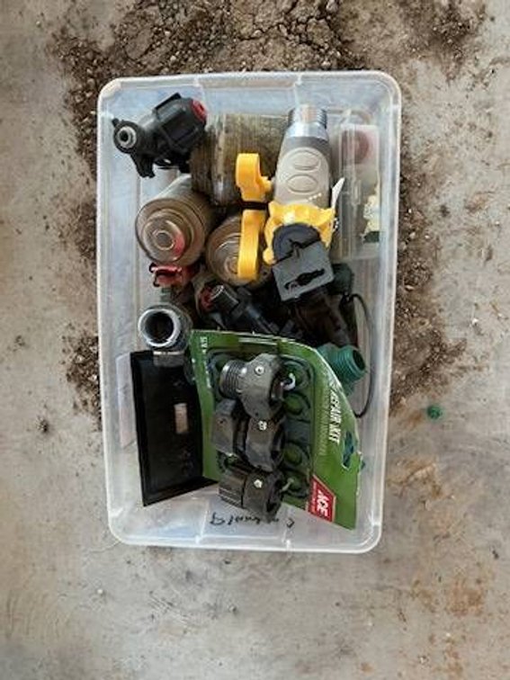 Box of Water Hose Attachments and Fittings