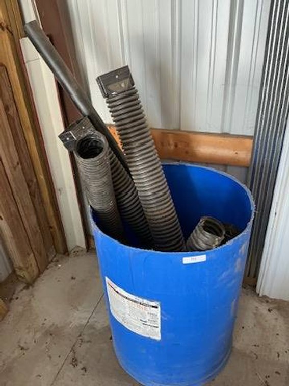 Various Drainage Tile and Blue Barrel