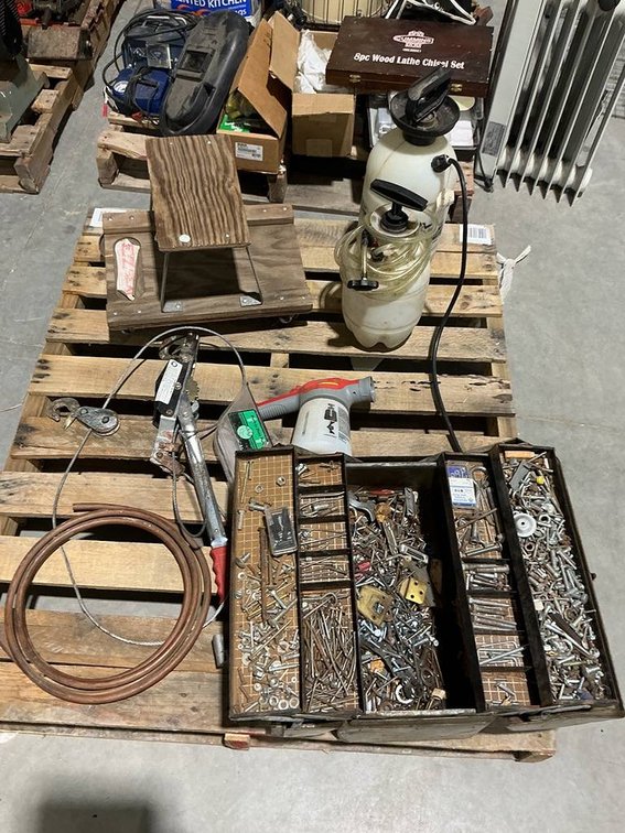 This lot Contains Copper Pipe, Rolling Mechanic Chair, Come-A-Long, 3- Spray Jugs, and a Tool Box Full of Nuts and Bolts