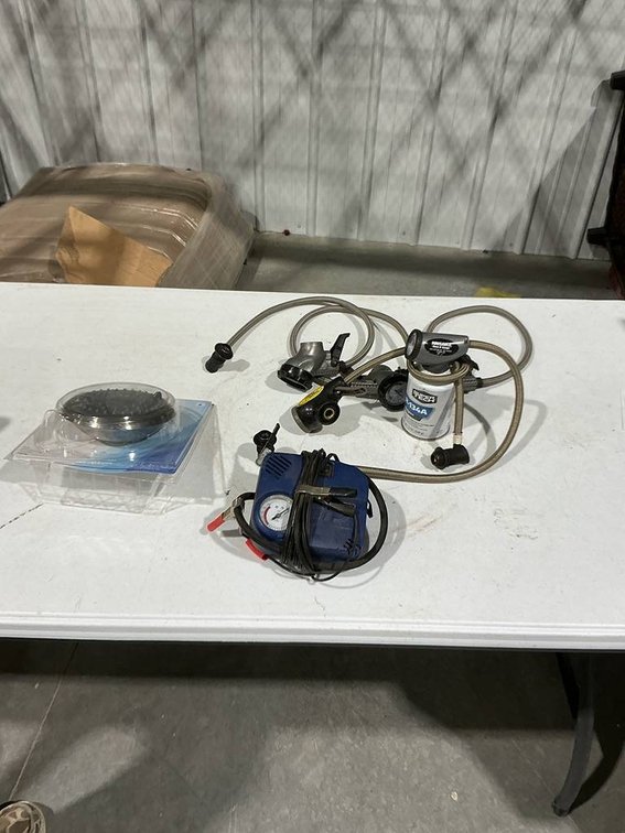 Home impression Rain Showerhead, 5- A/C Recharger Adapters, and a Battery Powered Tire Inflator