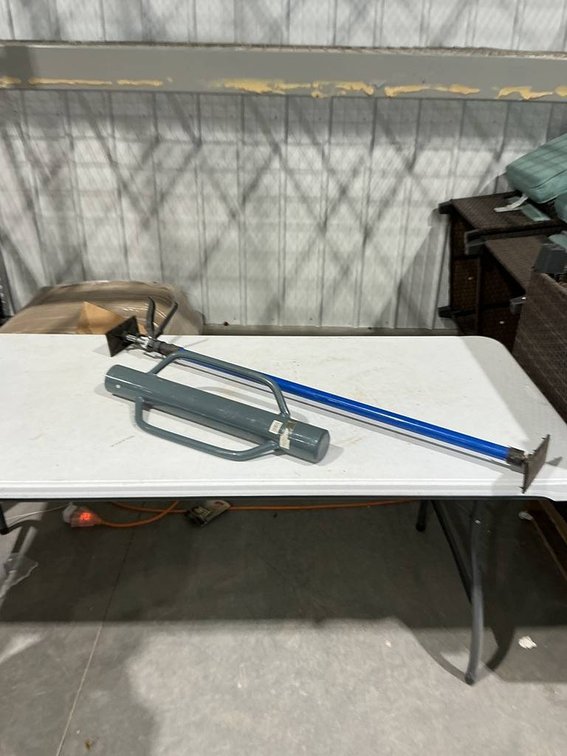 Post Driver and a Adjustable Support Bar