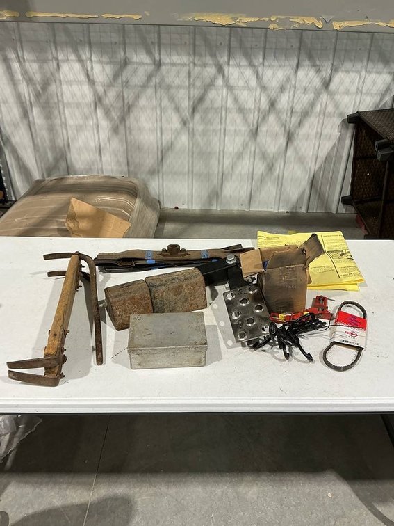 Mower Blades, Homemade Brick Grapple, Rethread Bits, Hitch Step, Wheel Chalks, and a Bag Filter