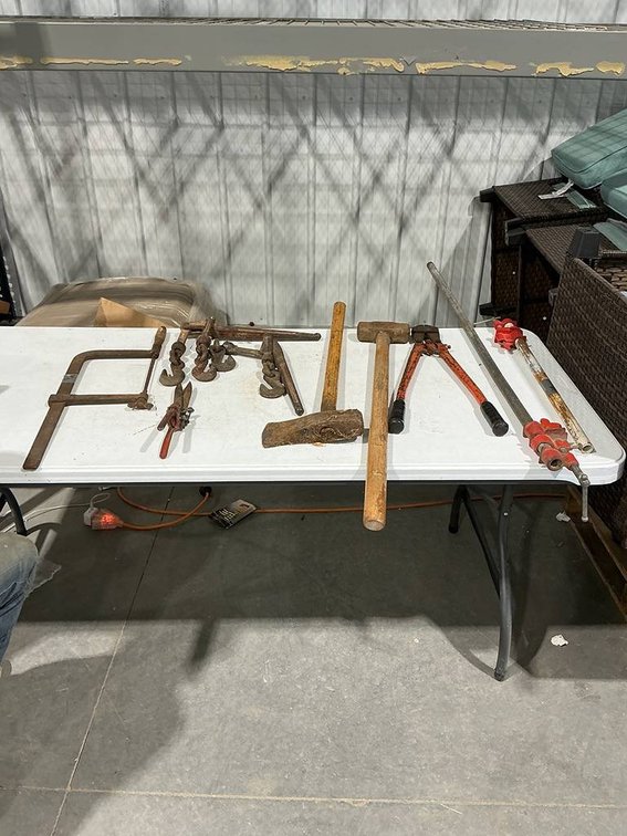 Handsaw, 2- Snap Binders, Trimmers, Bolt Cutters, Sledge Hammer, Axe, and 2- Wood Clamps