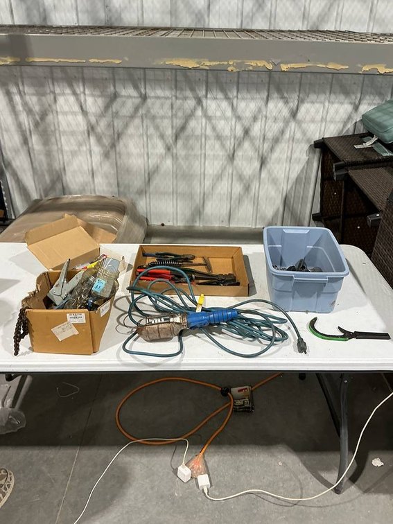 Welding Tools, Air Quick Connect Fittings, Work Light, Pliers, Drill Bits, Wrenches, and a Chicago Pneumatic Air Grinder, Central Pneumatic Brad Nailer, and a Craftsman Pneumatic Stapler