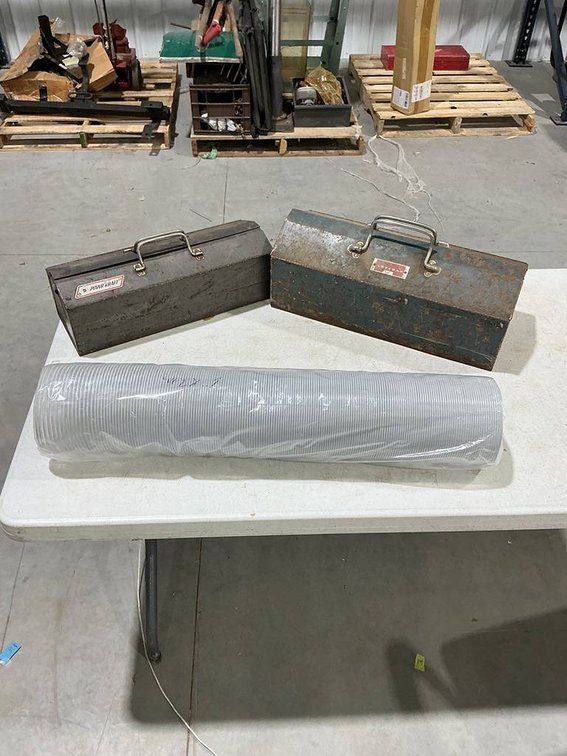 Tool Box with Pliers and a Pneumatic Grinder, Powr-Kraft Tool Box with Sockets and Wrenches, and a Vent Tube