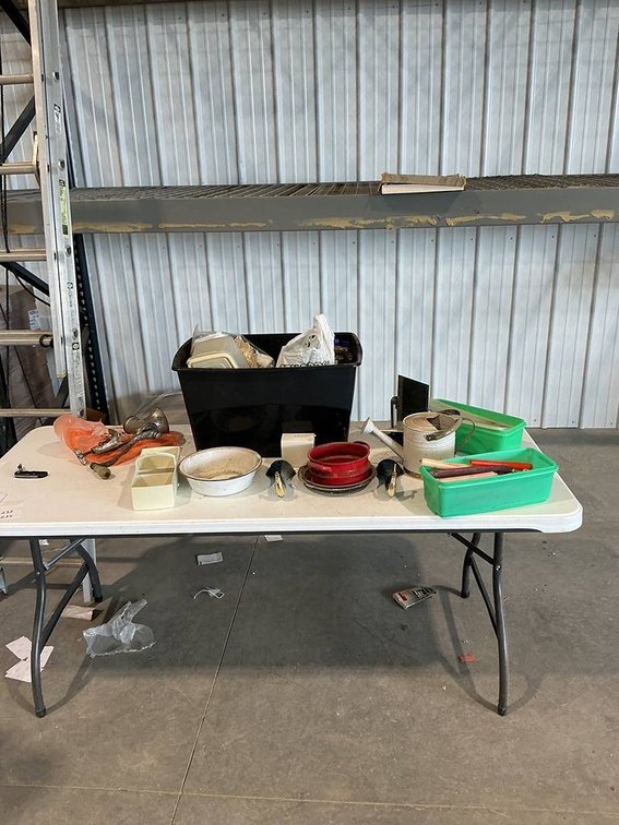 Lot Containing Candles, a Meat Grinder, Metal Dishes, Glass Cologne Decorative Bottles, a Mirror and More