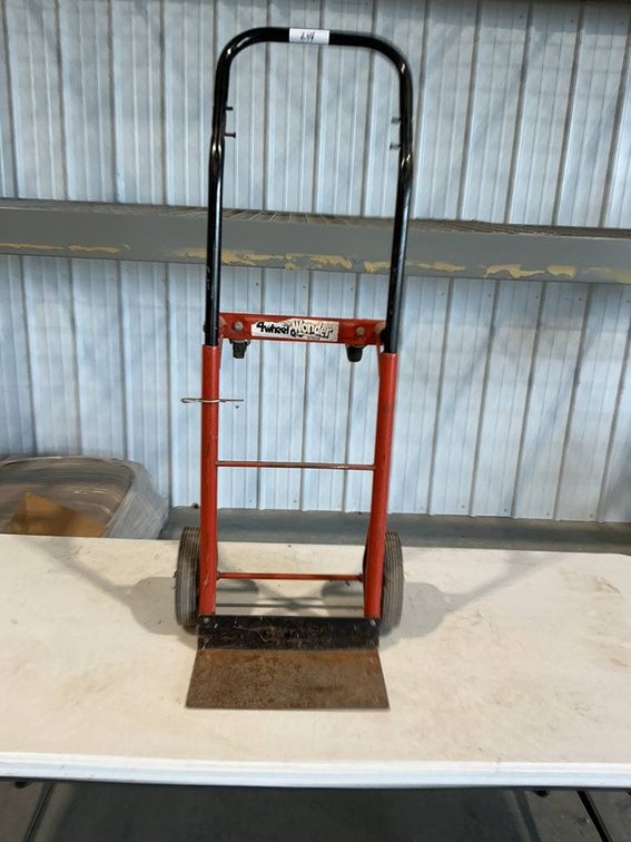 4 Wheel Wonder Dolly that is adjustable and able to turn into a cart