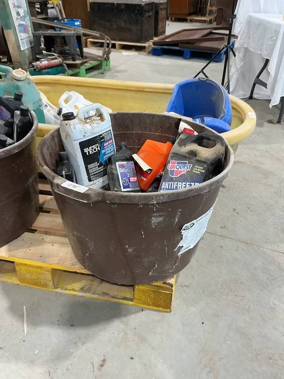 Tub of Oil Filters and Diesel Fuel Filters along with Anti-Freeze, Grease, and Motor Oil