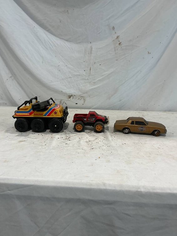 Tonka Plastic 6x6 Toy Car, Ertl Plastic 80' Chevrolet Monte Carlo, and a Tonka Push-To-Drive Plastic Toy Pickup Truck