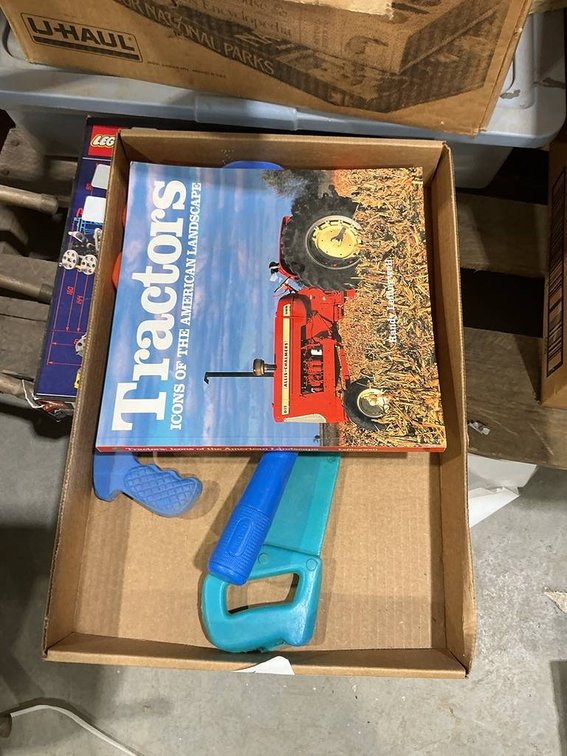 Box of Toy Tools and Tractor Book