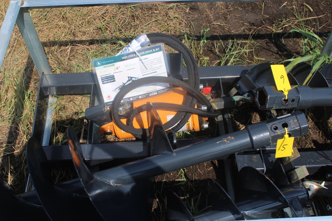 Unused 2025 Wolverine Skid Steer Post Hole Auger & 2 Bits