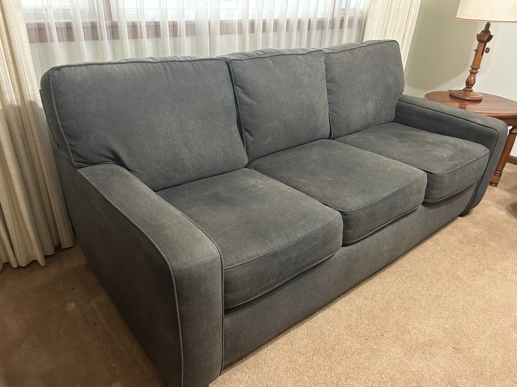 Grey Upholstered Sofa with Pull Out Bed