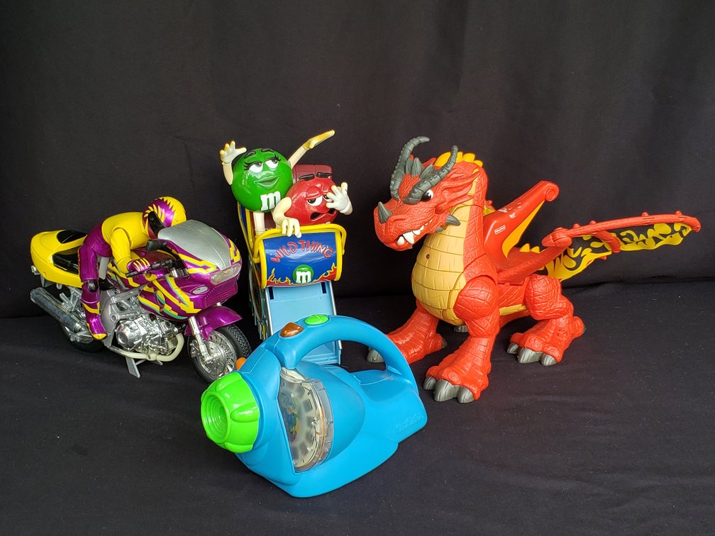 Toy Projector, Dragon Figure, Candy Dispenser, and Motorcycle