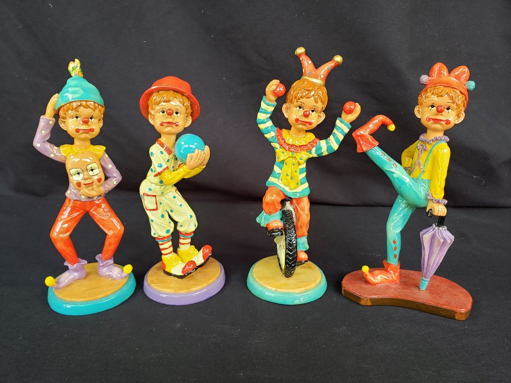 Set of Four Painted Clown Boy Figurines