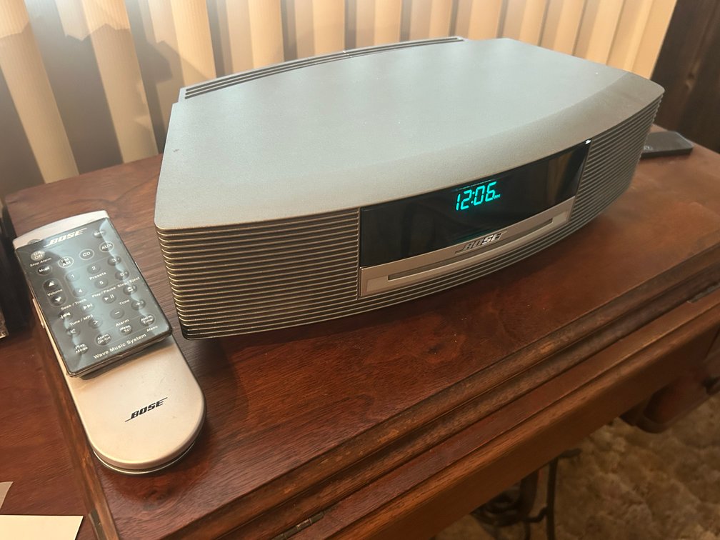 Bose Radio/CD Player.  This Lot Also Includes CDs