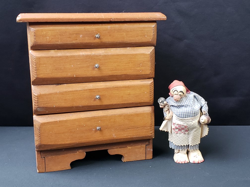 Miniature Wooden Four-Drawer Chest and Folk Art Figurine
