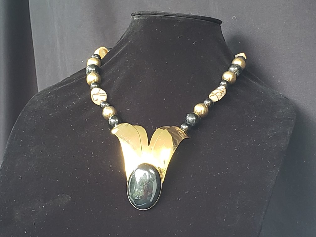 Beaded Necklace and Gold-Tone Flip-Flop Sandal