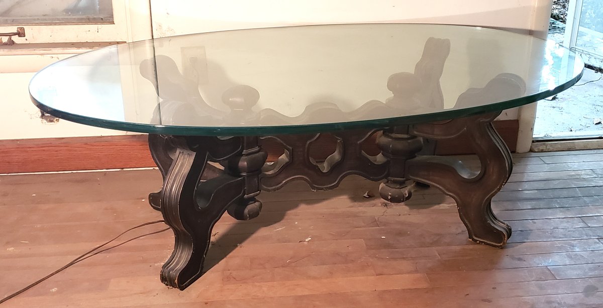 Glass-Top Coffee Table with Carved Wood Trestle Base
