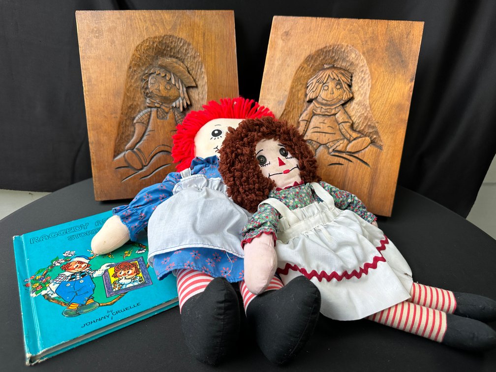 Raggedy Ann and Andy Cloth Dolls, Carved Wood Wall Plaques, and Book
