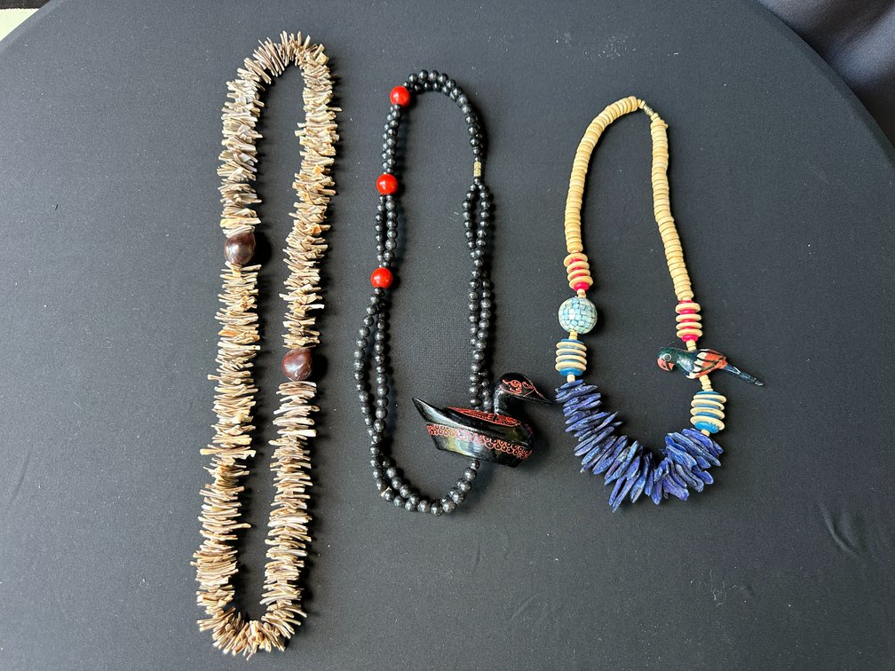 Beaded Necklaces with Carved Bird Pendants