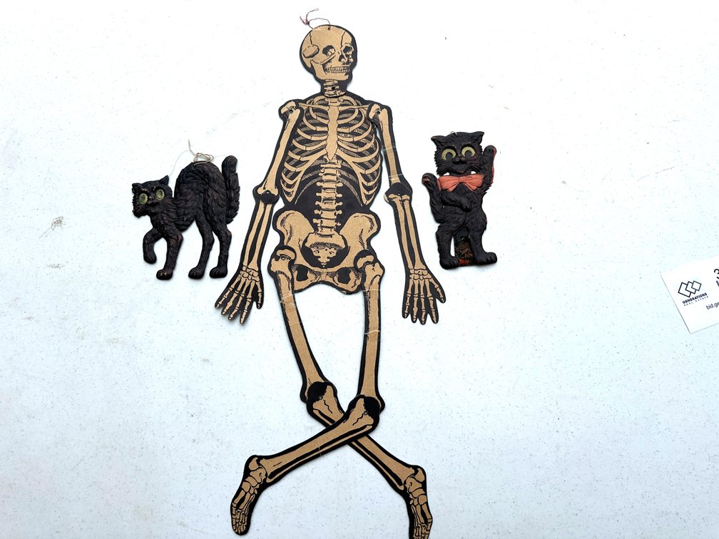Die-Cut Jointed Skeleton and Embossed Black Cat Cutouts