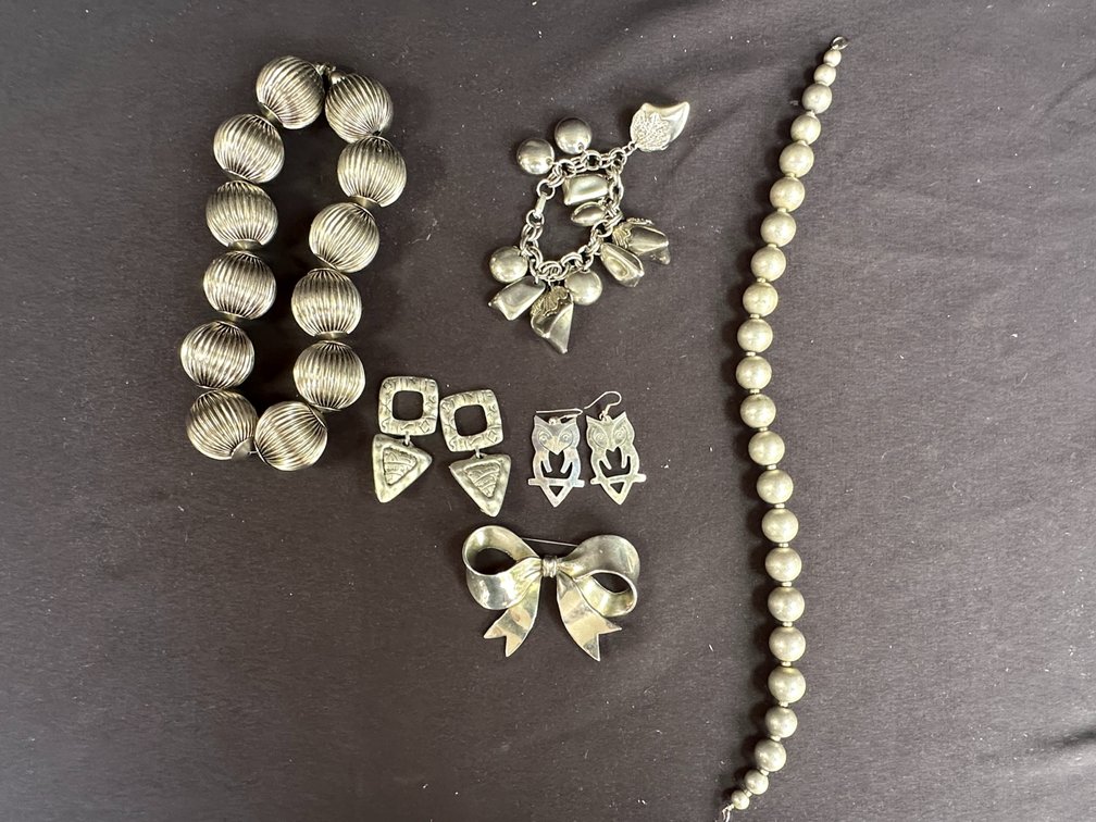 Silver-Tone Necklaces, Charm Bracelet, Brooch, and Earrings
