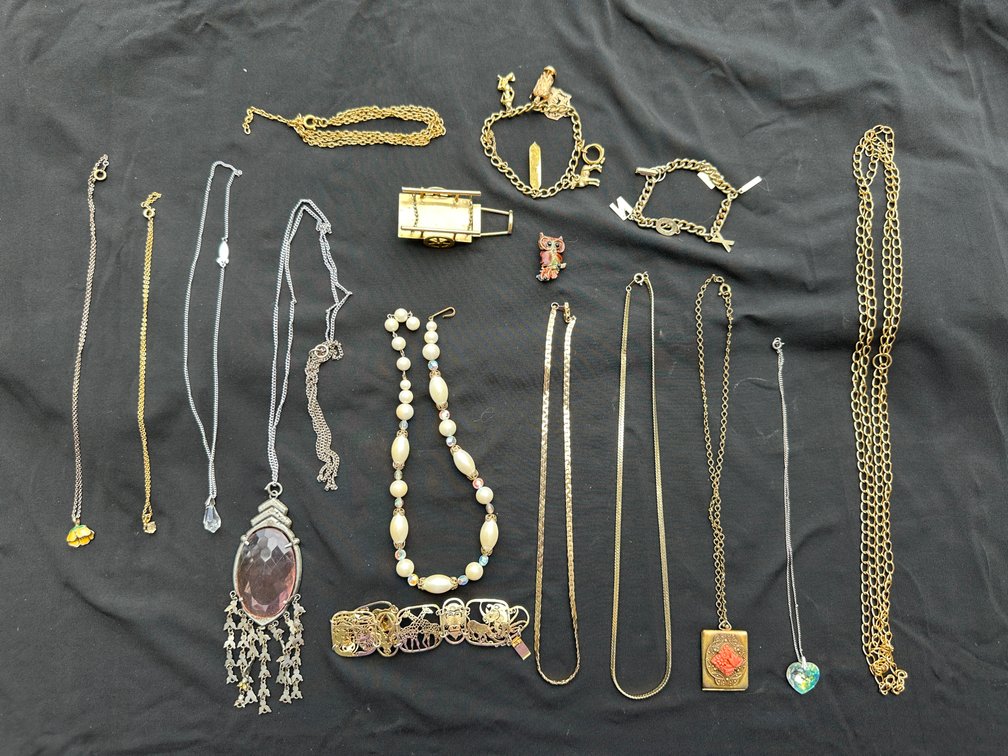 Costume Jewelry Necklaces, Charm Bracelets, and Brooches