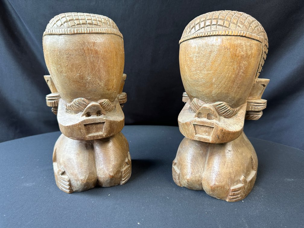 Pair of Carved Wood Stylized Figural Bookends