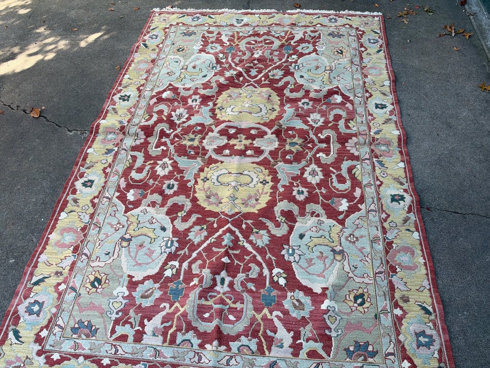 Rust Red Woven Floral Area Rug with Fringe