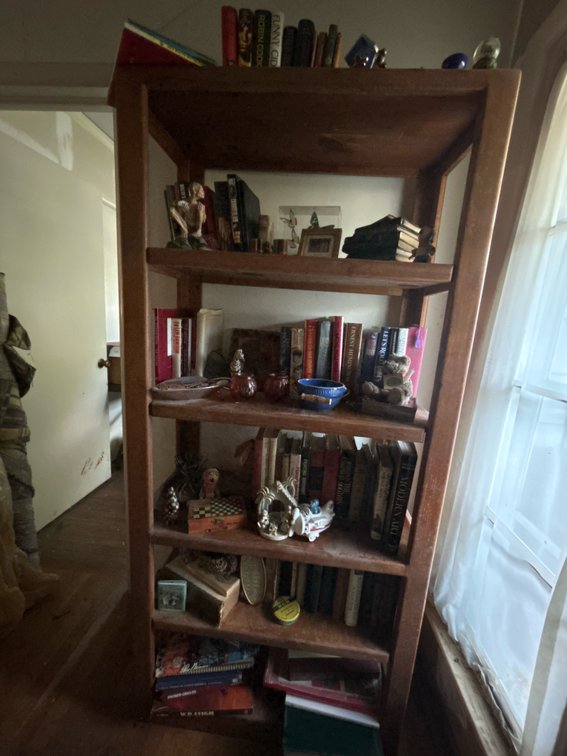 Wooden Six-Tier Bookshelf with Books and Decorative Items