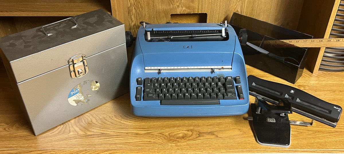 Vintage IBM Typewriter with Office Supplies