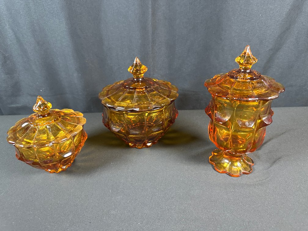 Amber Pressed Glass Lidded Dishes and Footed Jar