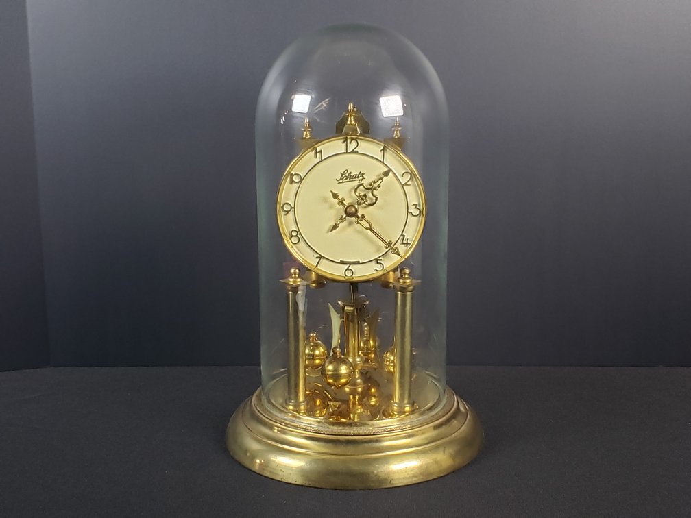 Schatz Brass Torsion Pendulum Clock with Glass Dome