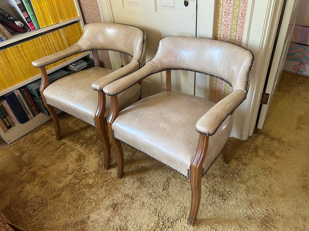 Pair of Beige Vinyl Barrel-Back Armchairs