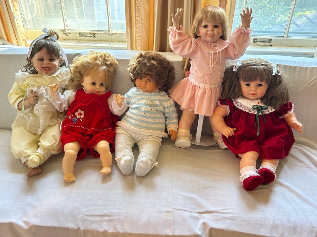 Collectible Vinyl and Fabric Baby and Child Dolls