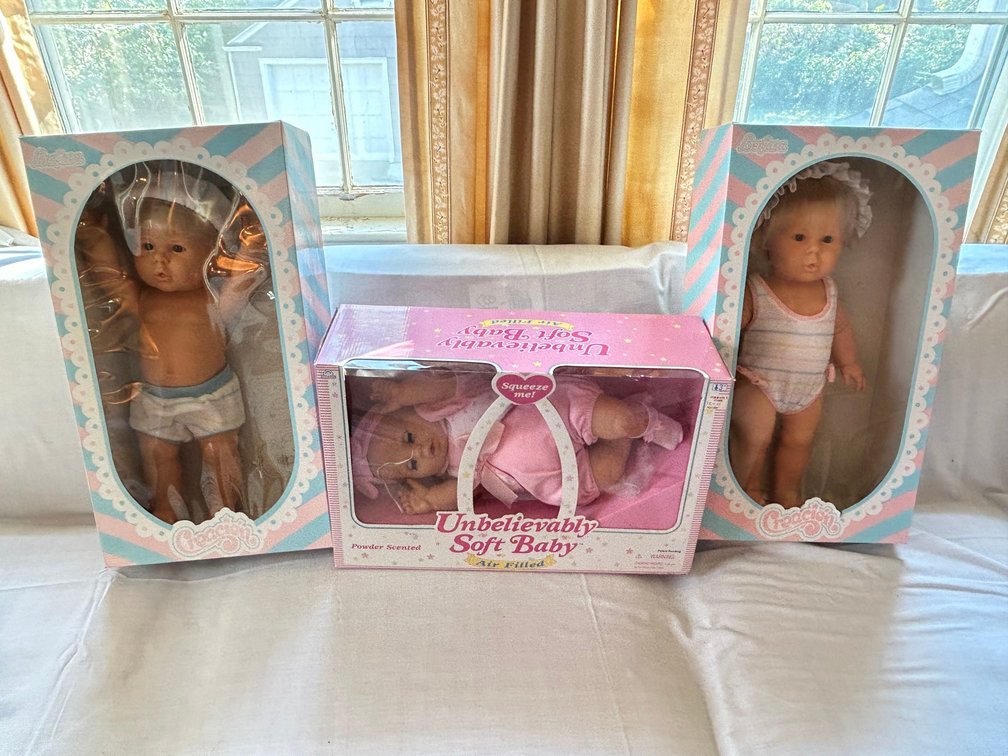 Three Boxed Baby Dolls in Original Packaging