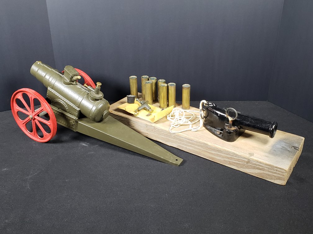 Cast Metal Model Cannons, Brass Casings, and Accessories