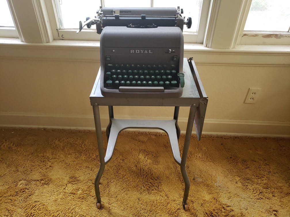 Manual Typewriter with Metal Rolling Stand