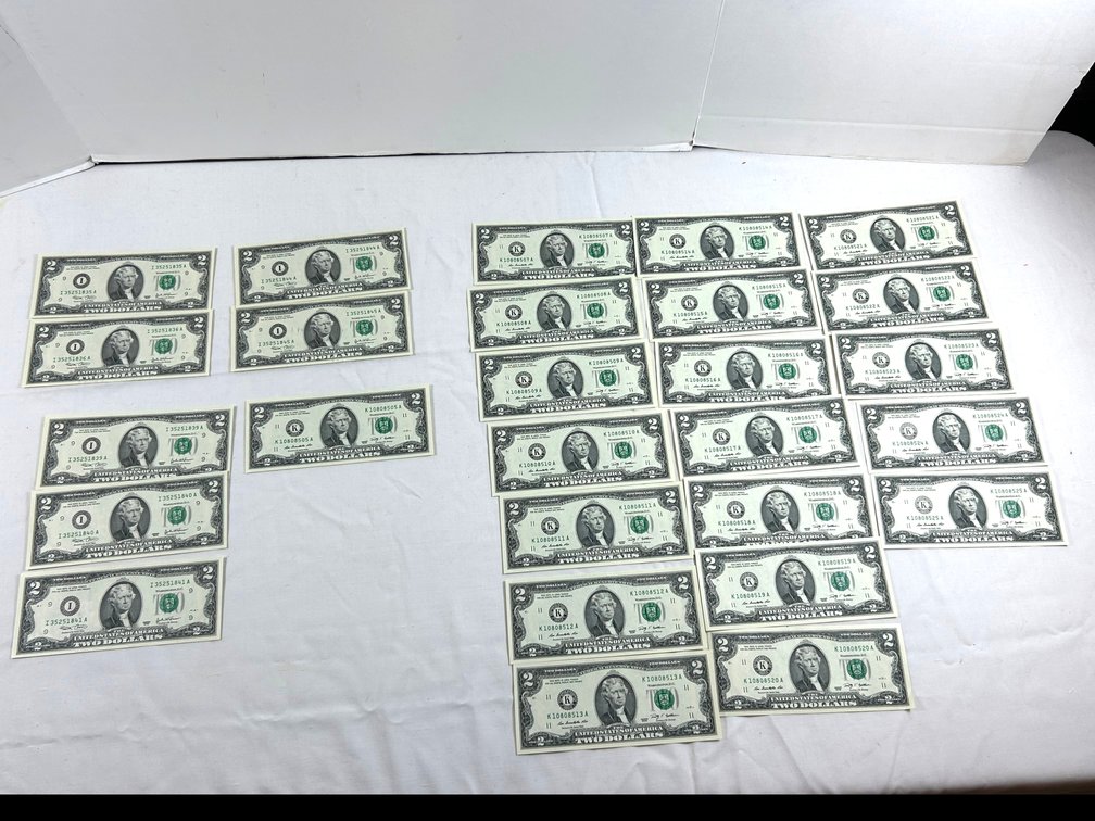 Two Dollar Bills in Sequential Order