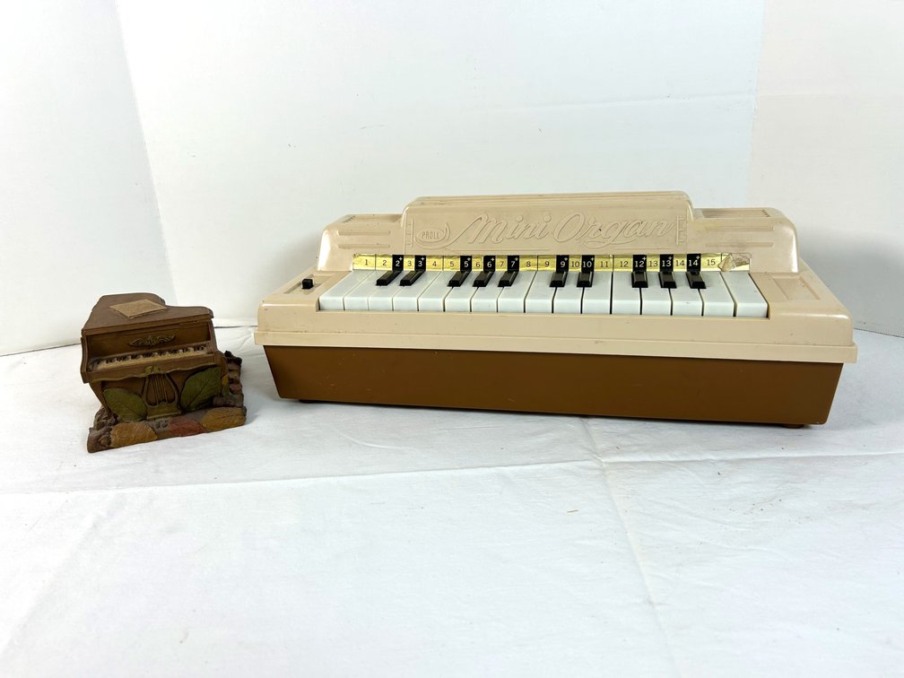 Tom Clark  Piano and Battery Operated Toy Organ