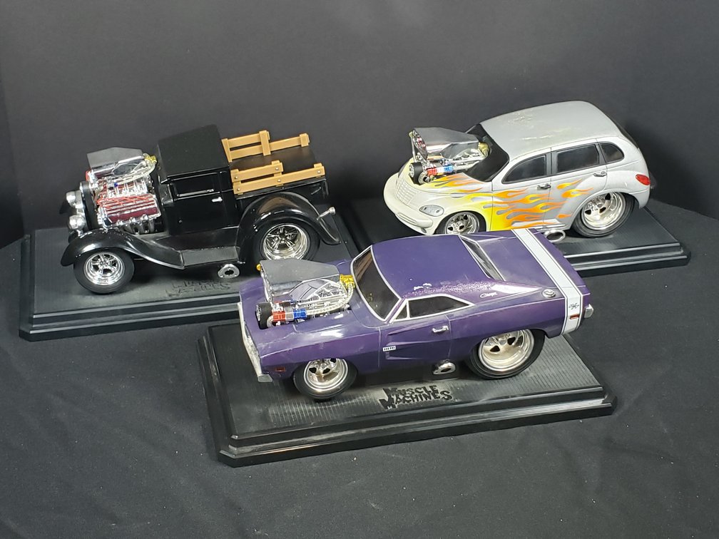 Muscle Machines Die-Cast Model Cars on Display Bases