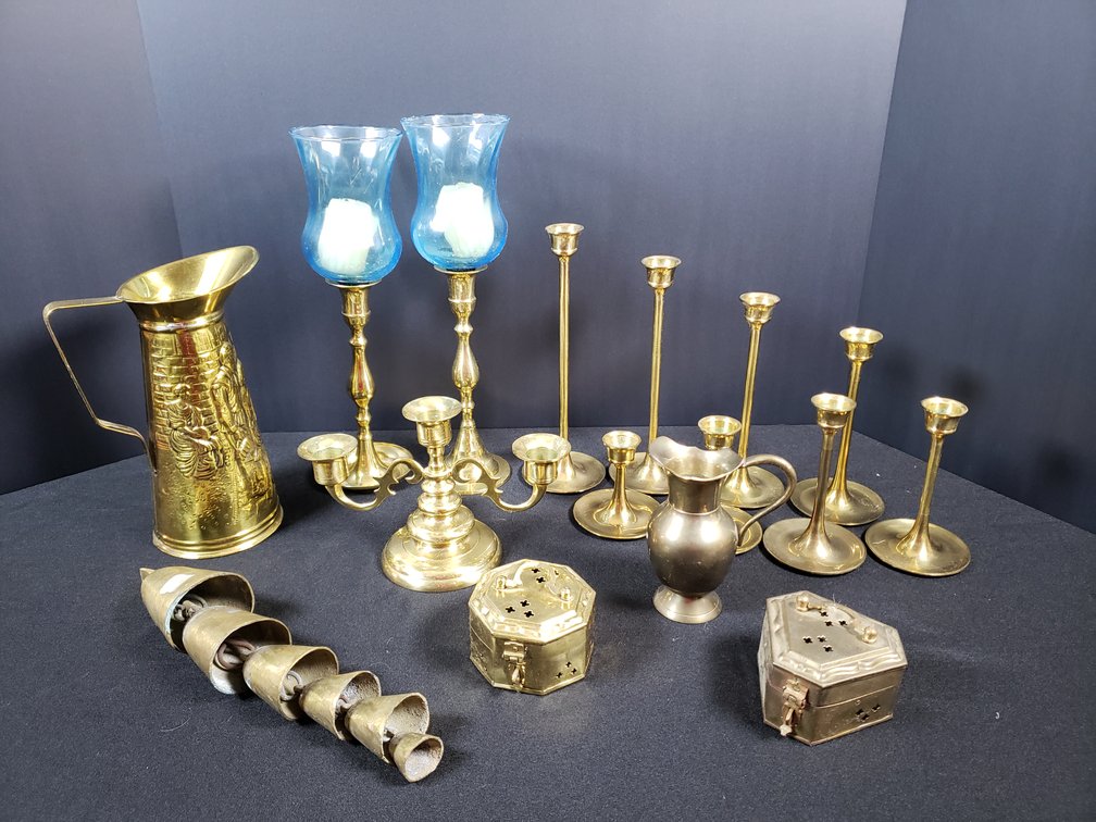 Brass Candlesticks, Hurricane Lamps, Pitchers, and Bells