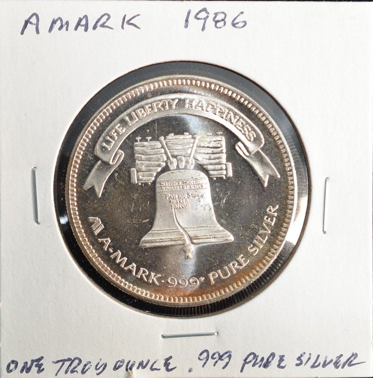 1986 Liberty Bell AMark Silver Round