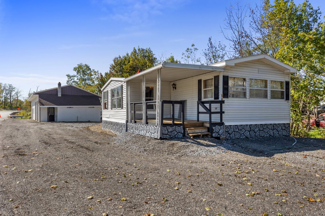 Image for Commercial Real Estate Auction - (+/-) 1.11 Acres with Block Building and Mobile Home