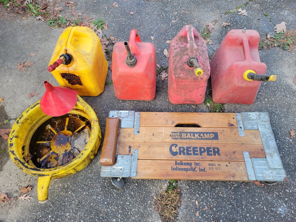 5 Gallon Gas Cans, Oil Pan, Creeper, Funnel