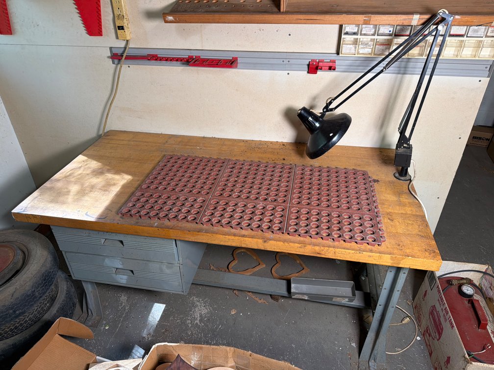 Metal work table with draft light