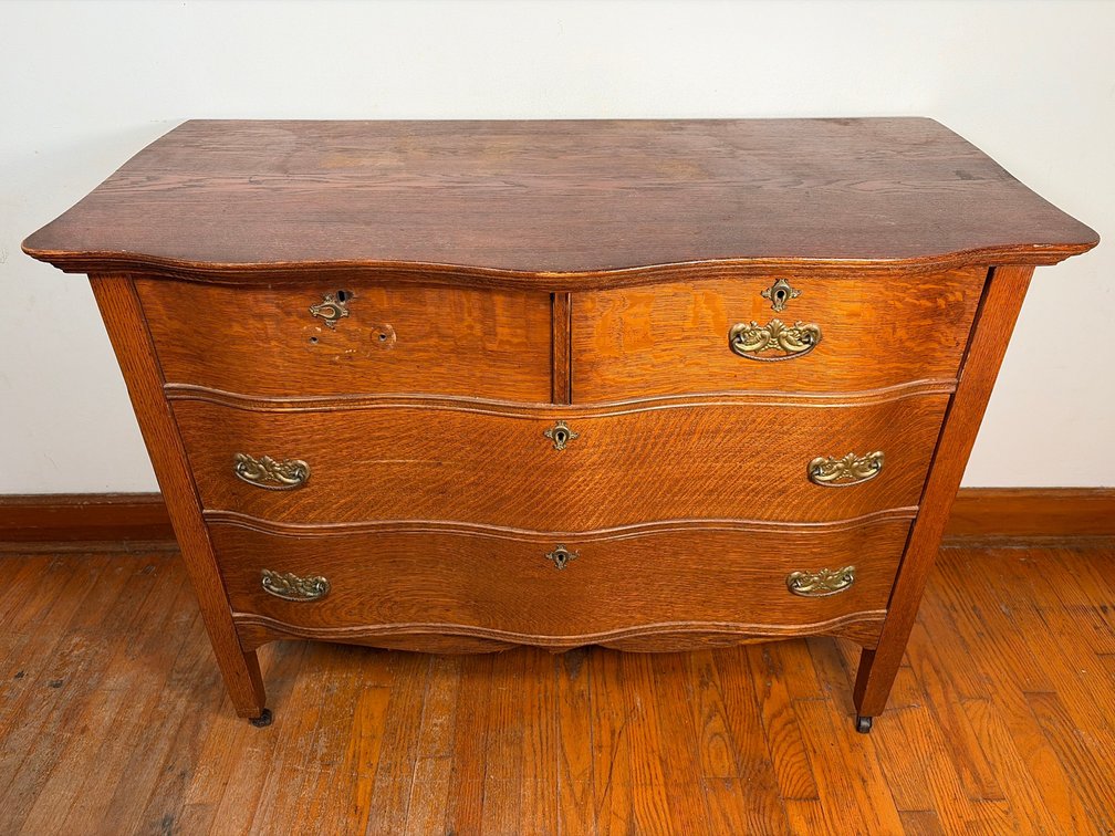 Two 4 Drawer Curved Wooden Dressers