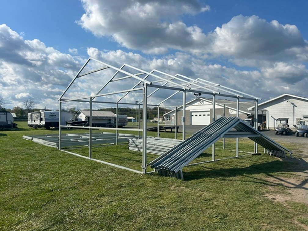 Metal Carport Frame 26'x 24'x 9'. Includes 5 trusses with building Frame